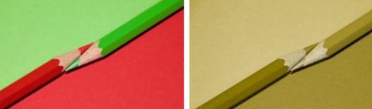 Rood en groen potlood aan de ene kant en aan de andere kant twee potloden in een bruine kleur.